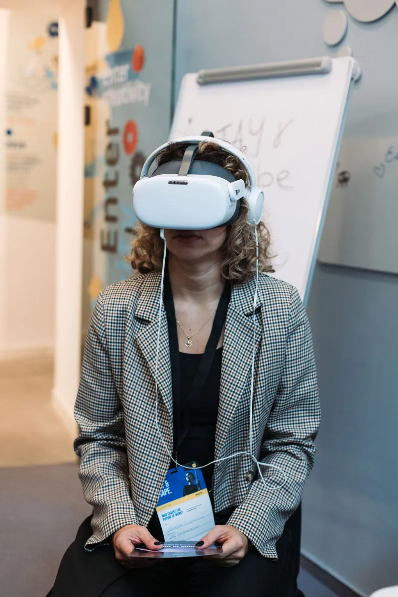 A participant tries a virtual reality headset