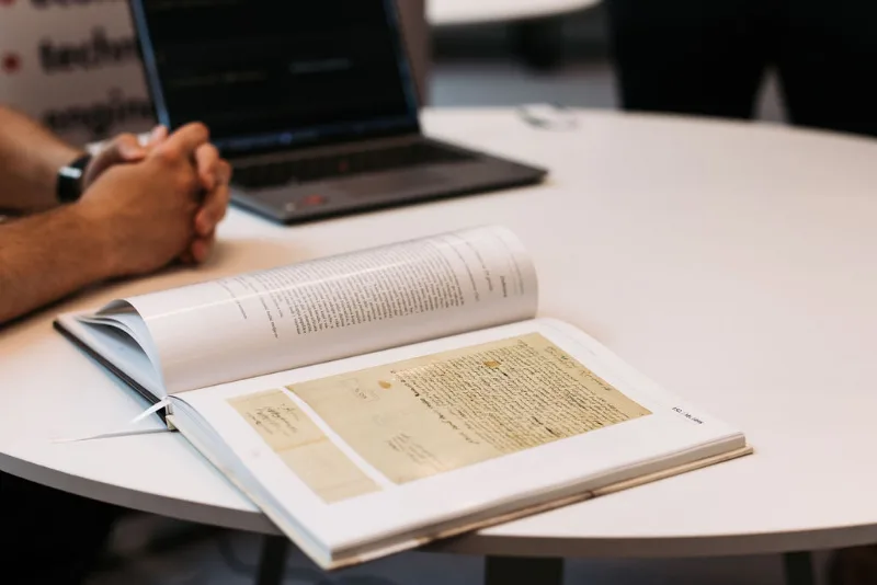 A closer look at a book and archival material