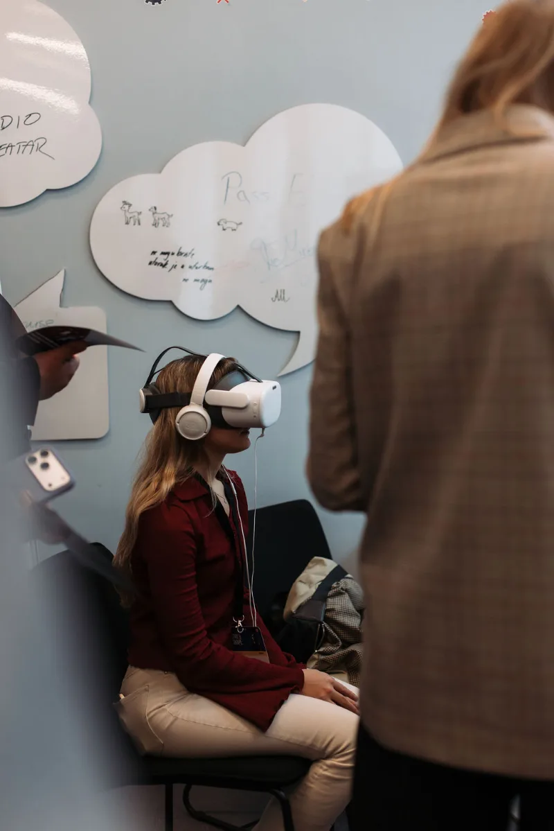 A participant tries a virtual reality headset