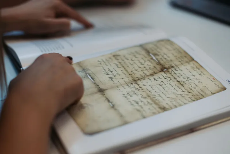 A closer look at a book and archival material